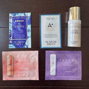 Sunday Riley Skincare Set with Blue, White, and Purple Packaging